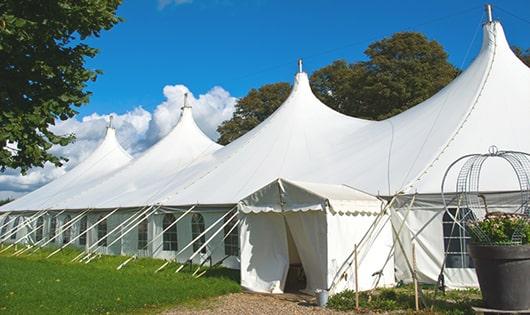 multiple portable toilets for large-scale outdoor events, ensuring availability for all guests in Crockett